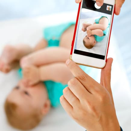 Baby wird fotografiert