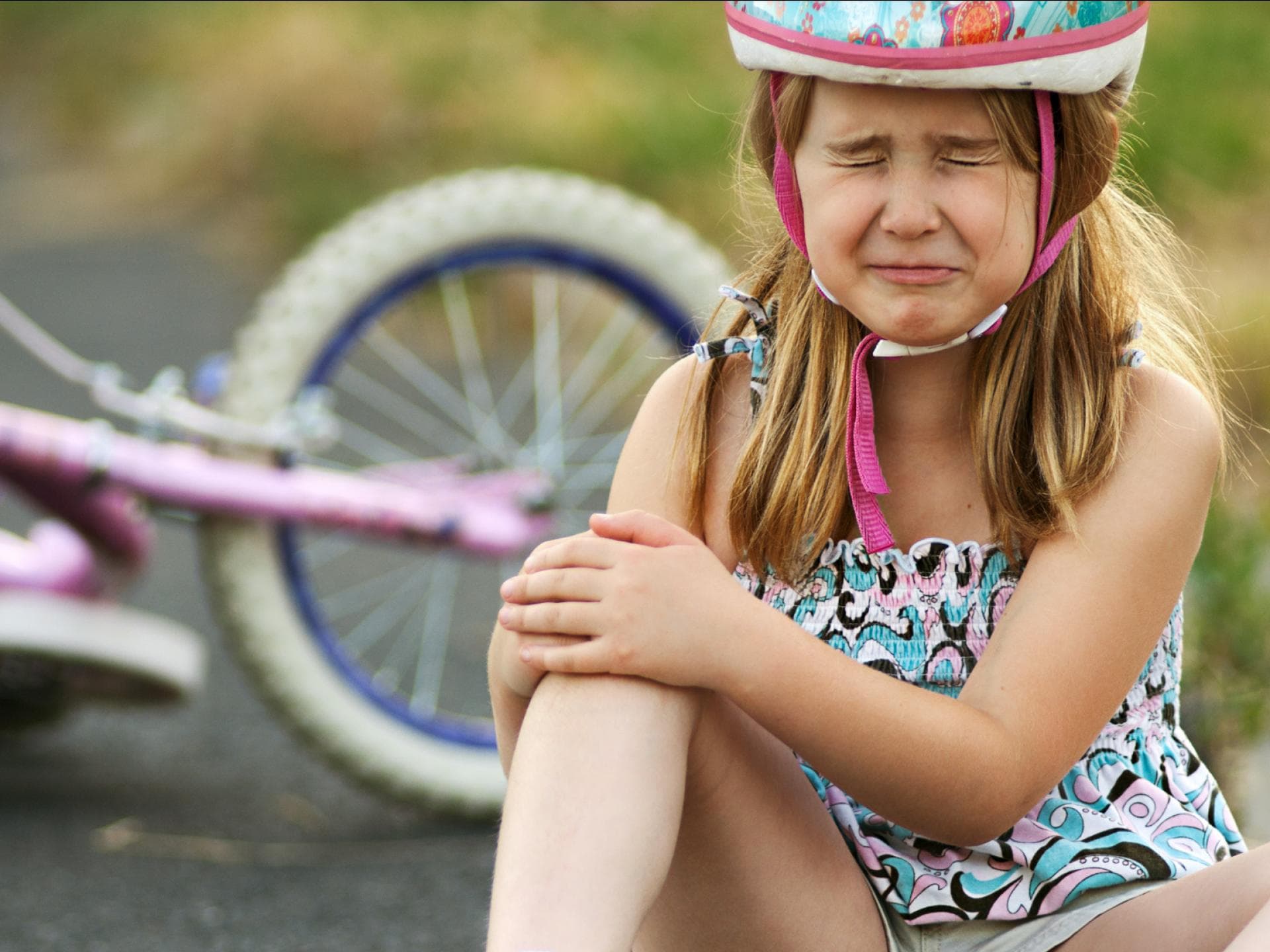 Immer weniger Kinder können Rad fahren. Ein Mädchen hatte einen Fahrradunfall.