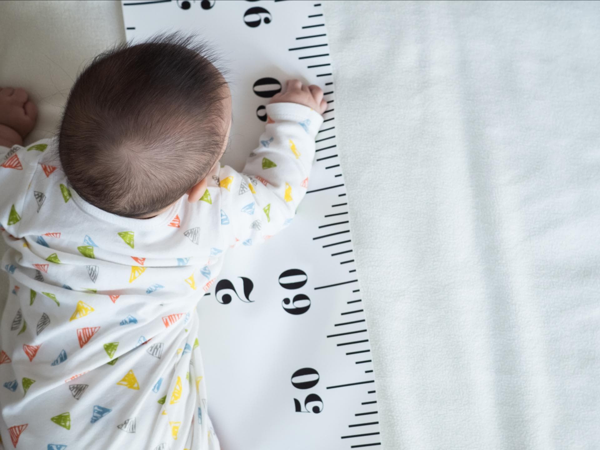 Baby auf Maßband Baby auf Maßband
