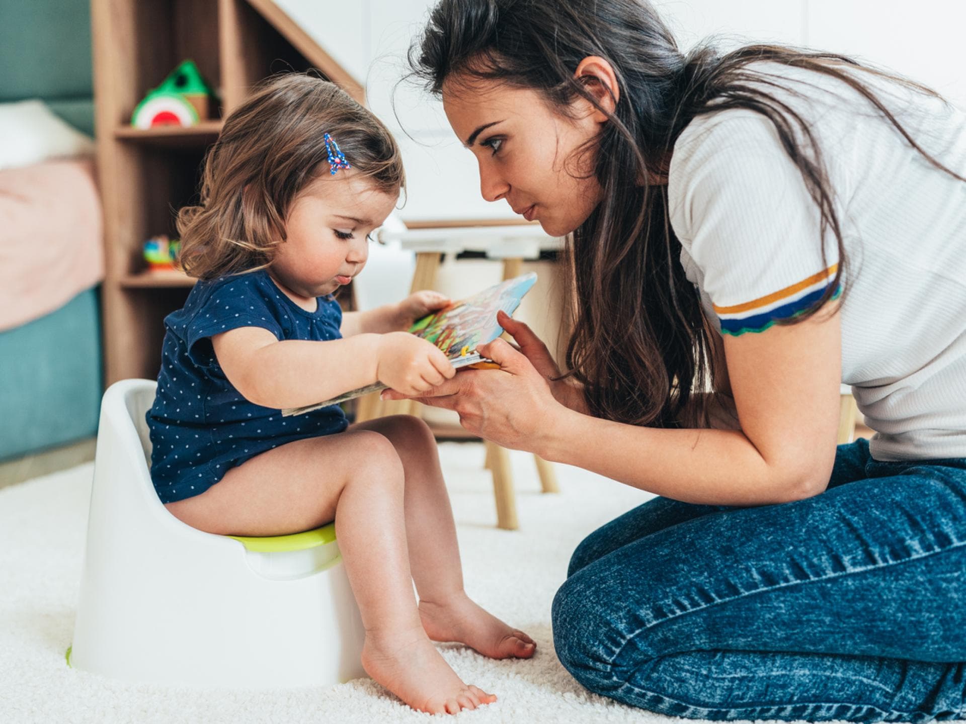 Töpfchen-Bücher können Kindern beim Trockenwerden helfen. 
