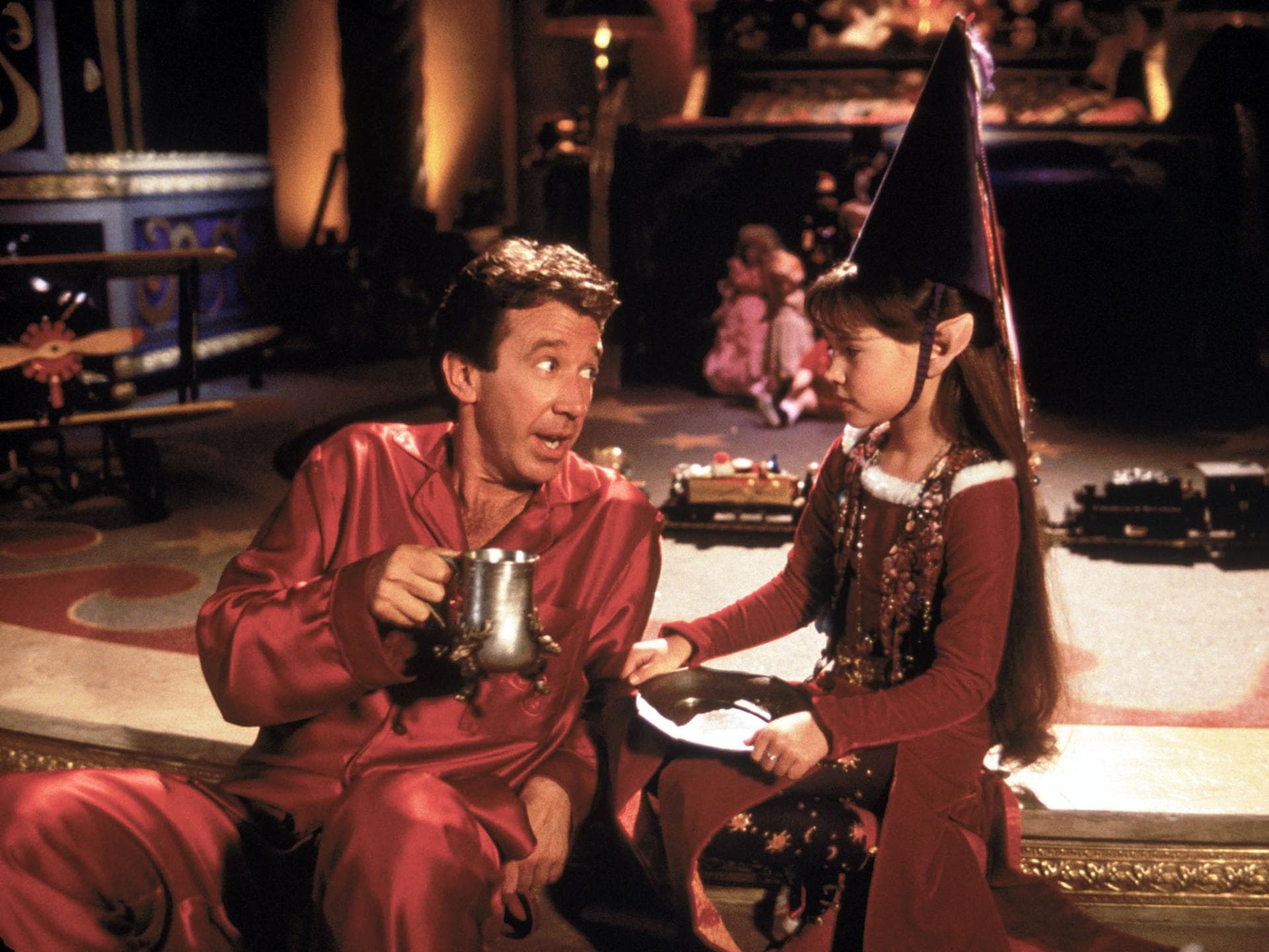 Tim Allen als Weihnachtsmann und ein kleines Mädchen.
